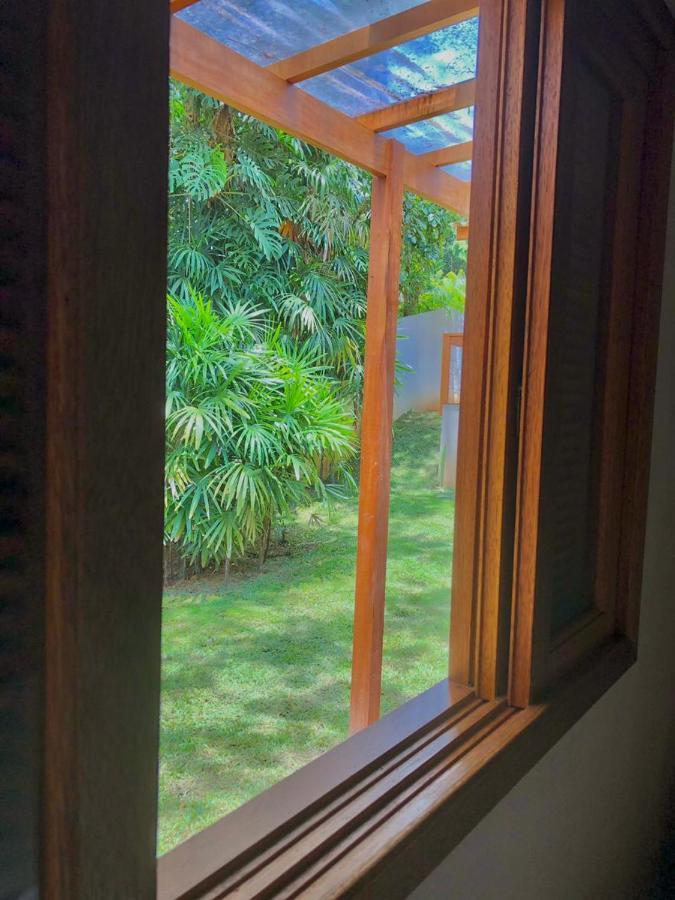 Suíte com Vista do Jardim