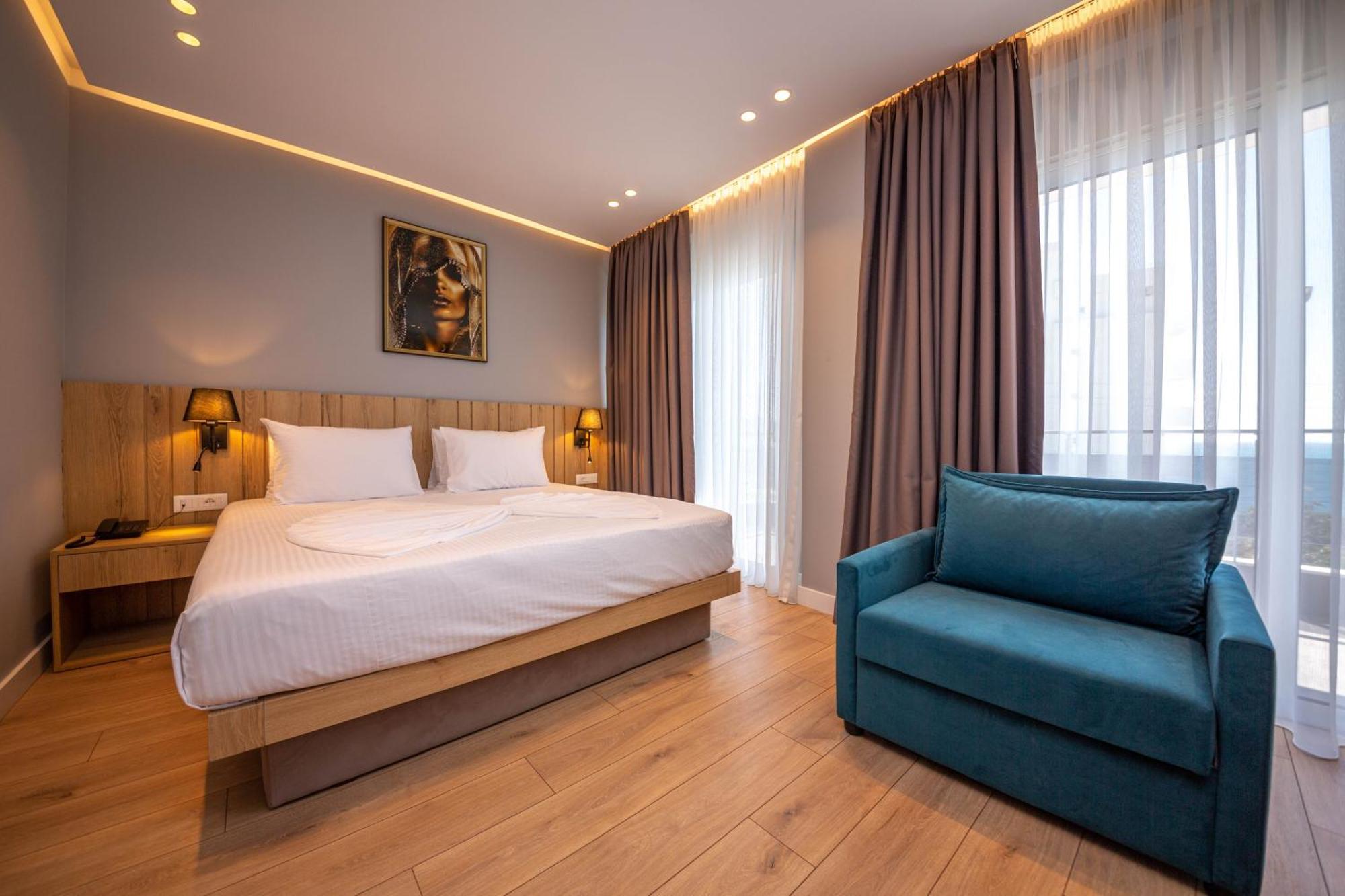 Deluxe Double + Sofa Bed with Balcony and Sea View