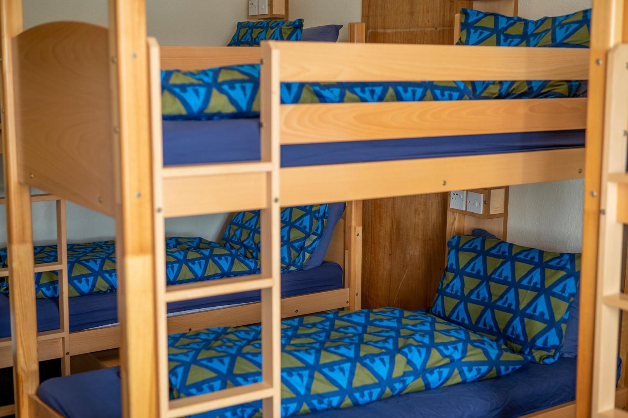 Bed in Female Dormitory Room,1593656670:JPEG