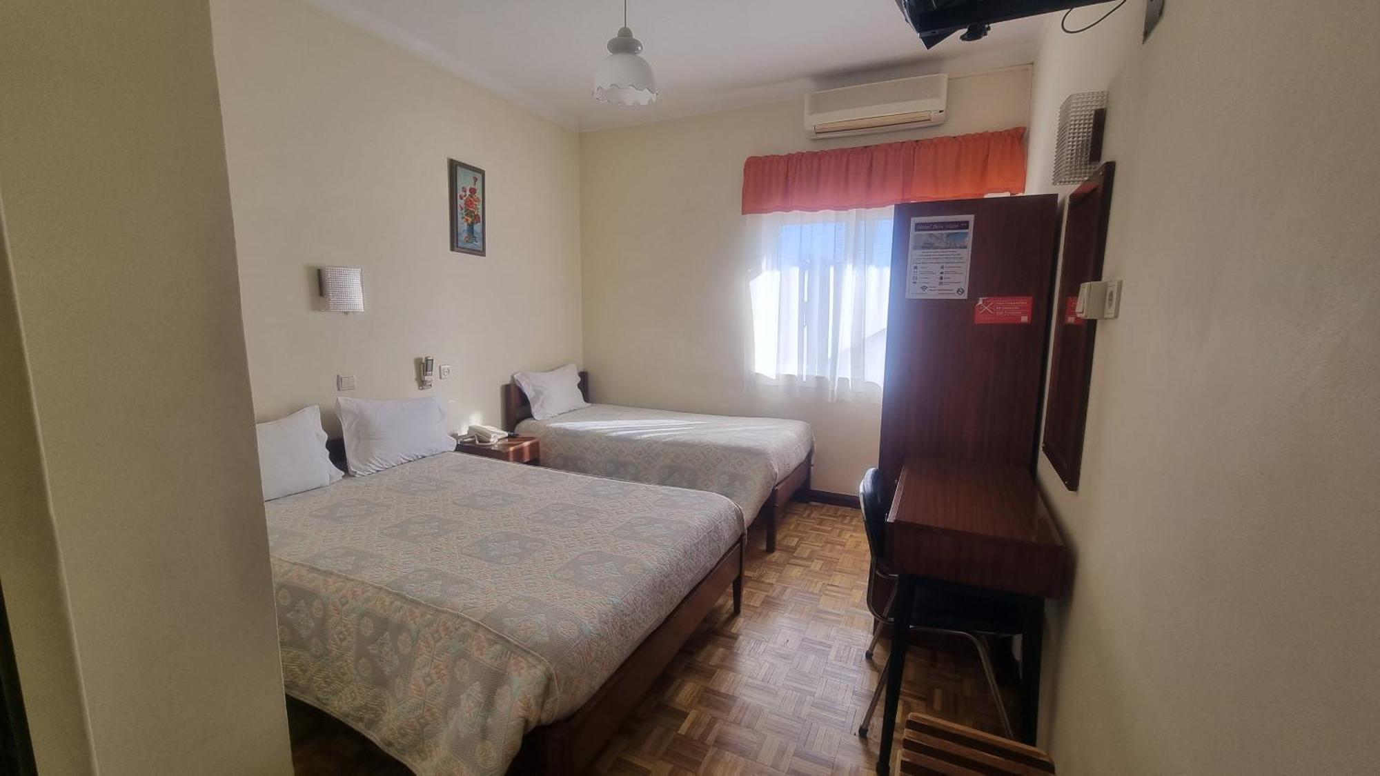 Quarto Duplo com Cama Extra (3 Adultos)