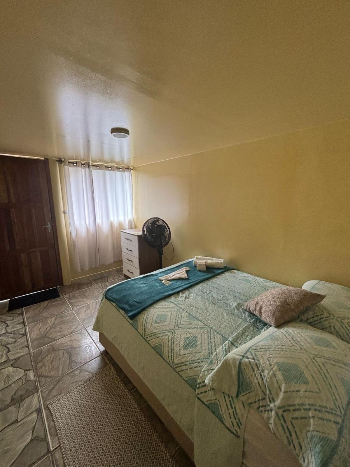 Quarto Duplo com Banheiro Compartilhado