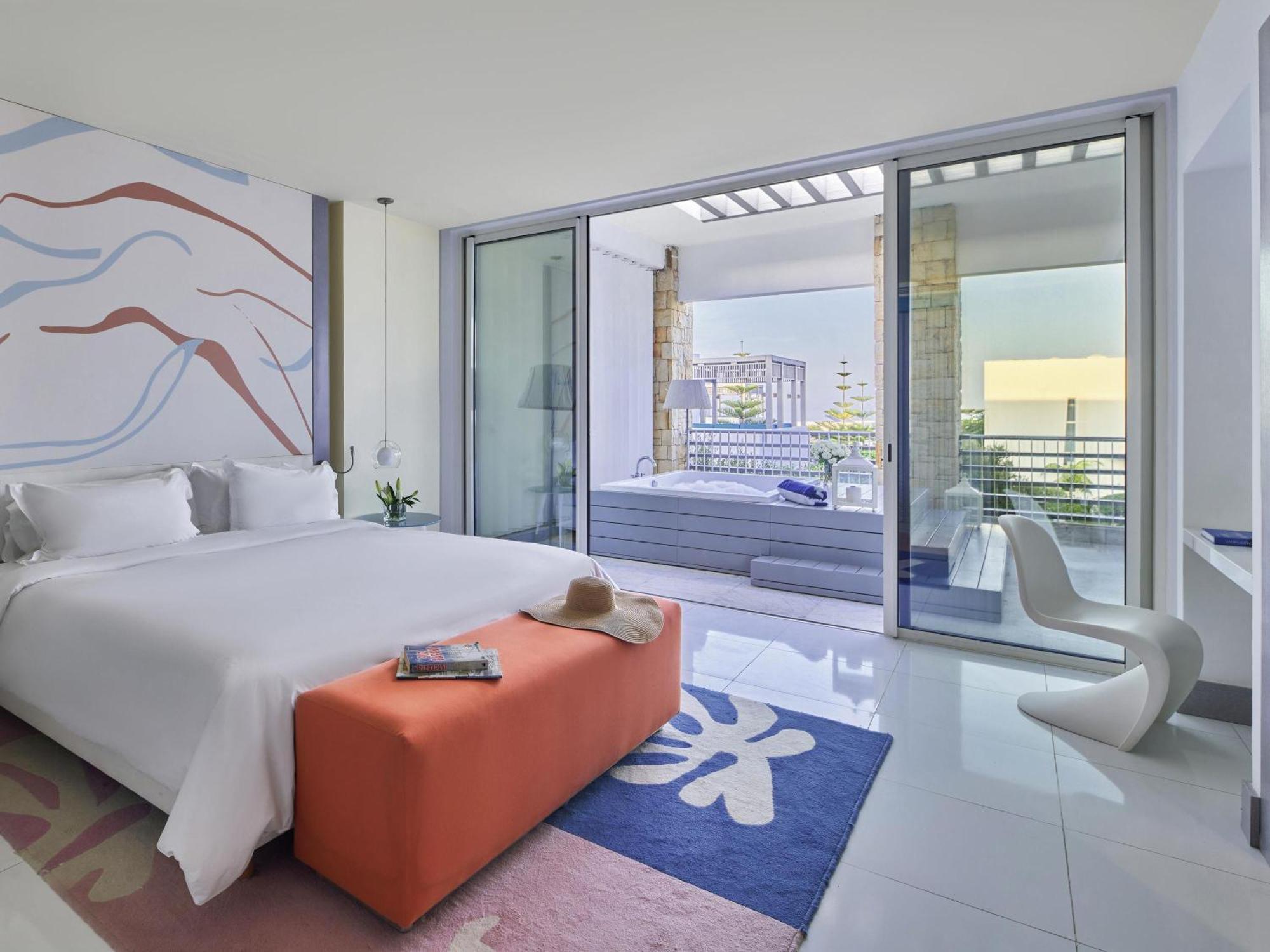 Suite 1 Lit King-Size Prestige avec Terrasse Privée et Bain à Remous - Vue sur Jardin