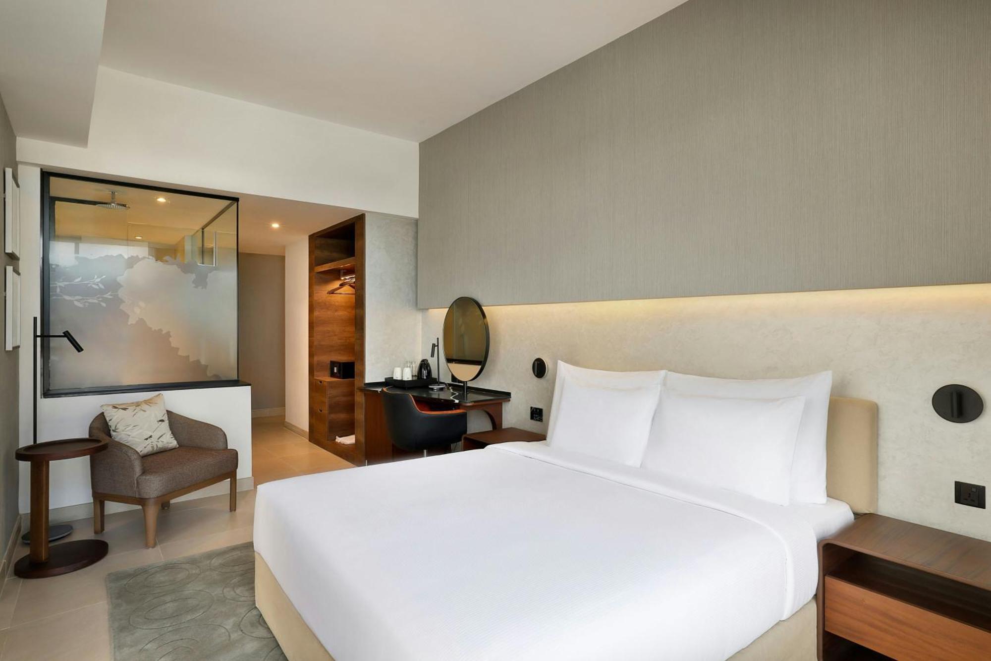 Two-Bedroom Family Room with One King Bed and Two Single Beds