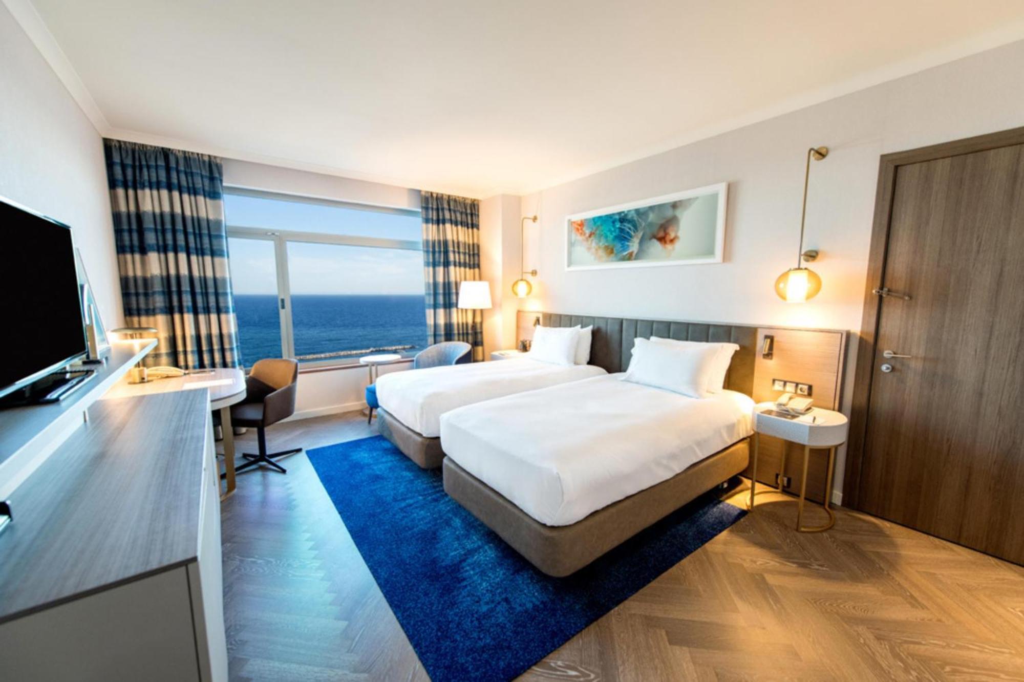 Quarto Executivo com 2 Camas de Solteiro e Vista do Mar