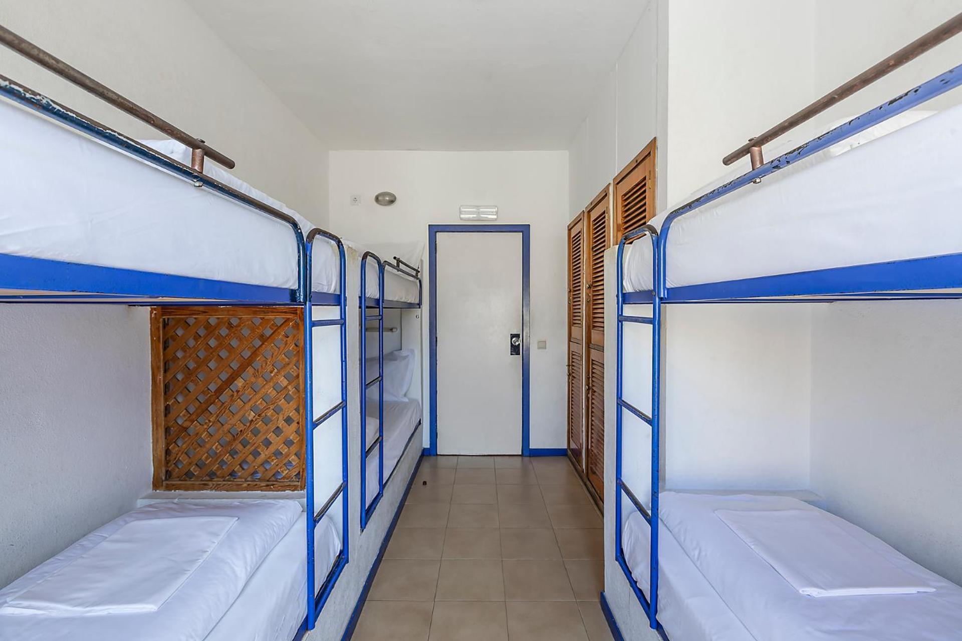 Cama em Dormitório Feminino com 6 Camas