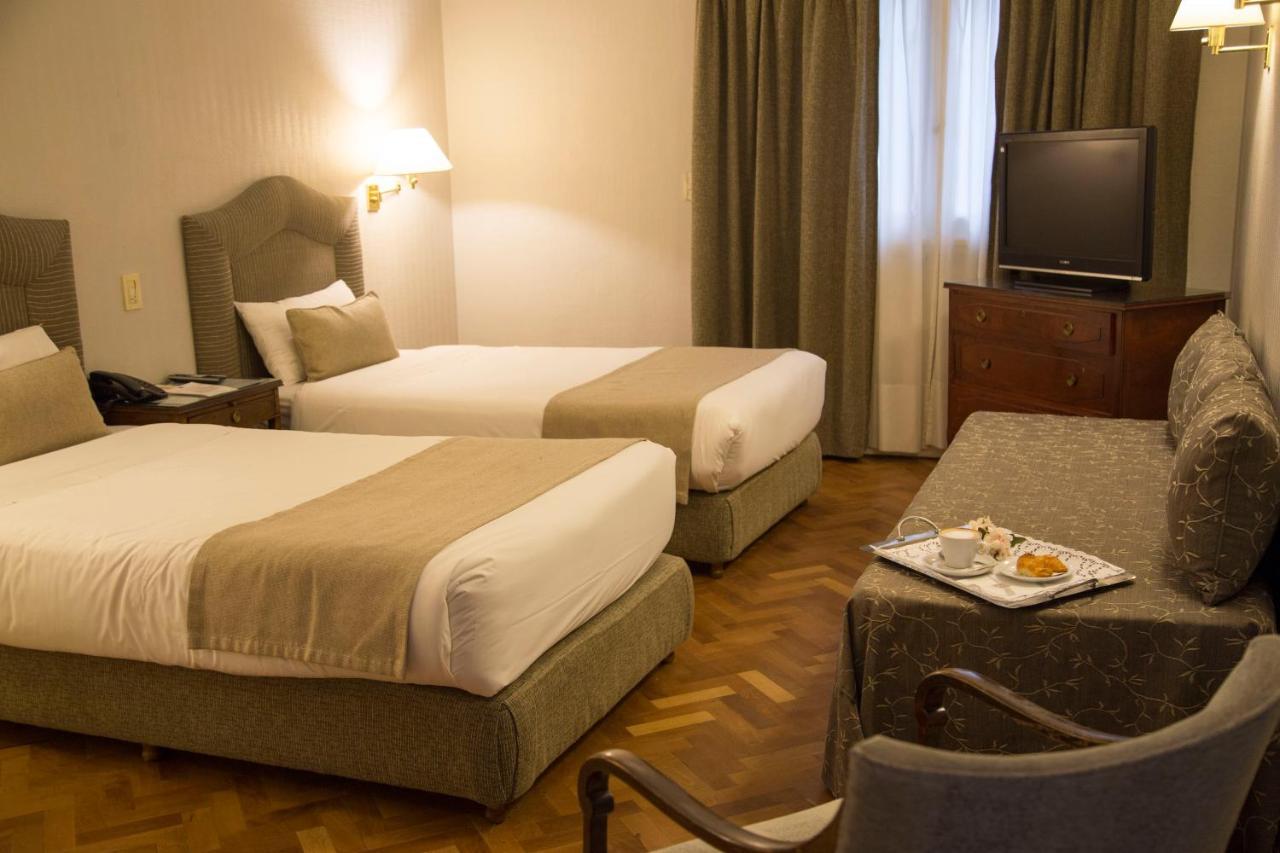Triple Room (2 Single Beds and 1 Extra Bed)