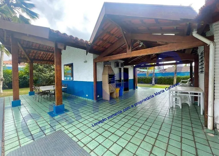 Pousada com piscina: Casa De Praia Guaruja